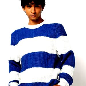 Man wearing a blue and white striped knitted sweater with a relaxed fit.