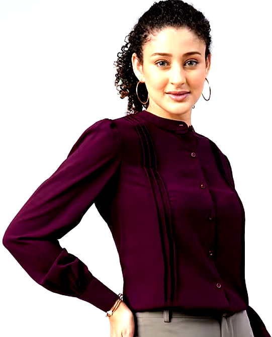 FITHUB 3 Woman wearing a plum-colored formal blouse with delicate pleats and gold hoop earrings.