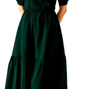 A smiling woman in an Istyle dark green midi dress, styled with soft curls and striped flat shoes.