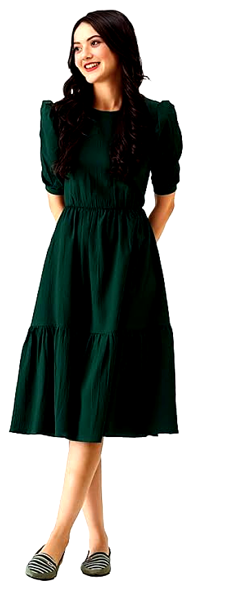 Istyle 5 A smiling woman in an Istyle dark green midi dress, styled with soft curls and striped flat shoes.