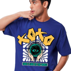 Man wearing a blue T-shirt with a large yellow graffiti-style "XOTO" text, an illustration of two hands holding a green eye-like sphere, and smaller text saying "Take a Look at the World."