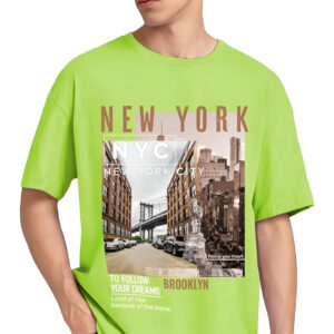 Man wearing a neon green oversized T-shirt with a New York City graphic design, featuring Brooklyn landmarks, motivational text, and images of the Statue of Liberty and cityscape.