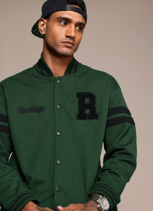 Men's jacket for winter 6 Front view of a green varsity jacket with black embroidered 'R' and 'Brooklyn' lettering.